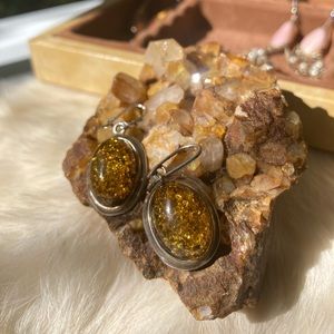 Large amber stone earrings with a fish hook closure